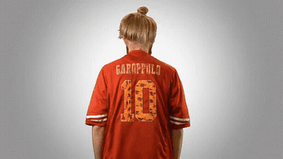 A Person Wearing A Red Jersey With The Number 10 On It GIF