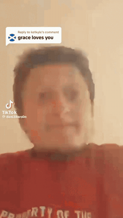 A Person Wearing A Red Shirt That Says Property Of The United States GIF