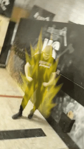 A Person Wearing A Shirt That Says ' Power ' On It Is Standing In Front Of A Wall GIF