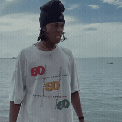 A Person Wearing A T-Shirt With The Number 50 On It GIF