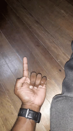 A Person Wearing A Watch That Says ' Tissot ' On It GIF