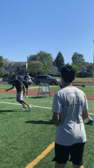 A Person Wearing A White Shirt That Says ' Rugby ' On The Back GIF