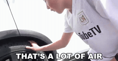 A Person Wearing A White Shirt That Says Tubetv GIF