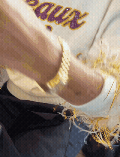 A Person Wearing A White Shirt With The Word Bruins Written On It GIF