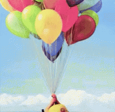 A Person Wearing A Yellow Hat Is Holding A Bunch Of Balloons GIF