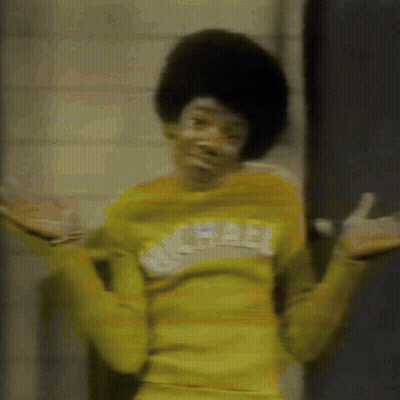 A Person Wearing A Yellow Shirt With The Word Free On The Front GIF