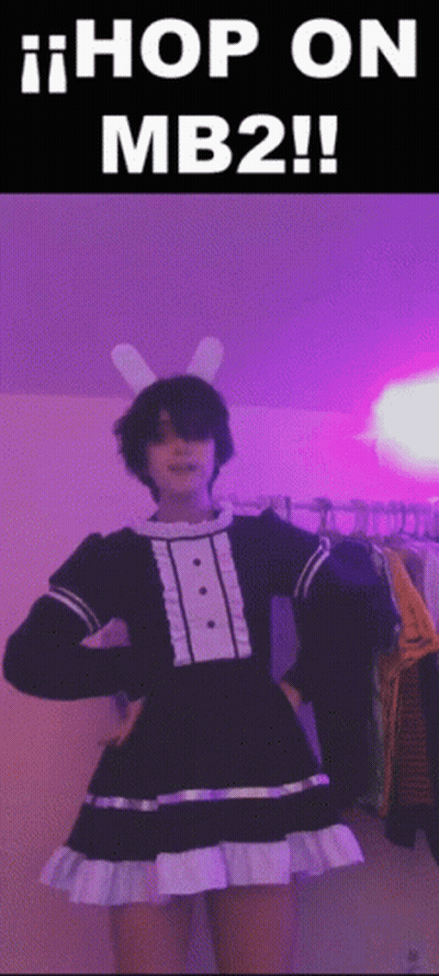 A Person Wearing Bunny Ears And A Maid Dress With The Words Hop On Mb2 Written On The Bottom GIF