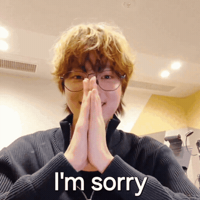 A Person Wearing Glasses Says I 'M Sorry GIF