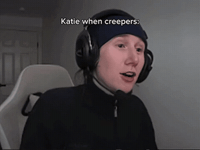 A Person Wearing Headphones And A Blue Hat With The Words Katie When Creepers On It GIF