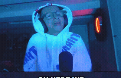 A Person Wearing Headphones And A Hoodie That Says Light GIF