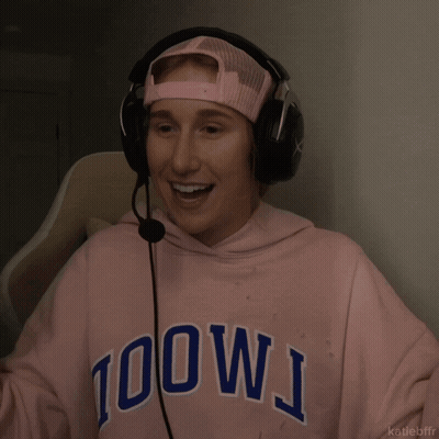A Person Wearing Headphones And A Pink Hoodie That Says 100Wj On It GIF