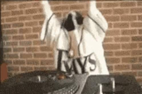 A Person Wearing Headphones And A Shirt That Says Rays GIF