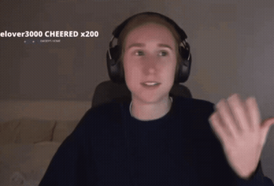 A Person Wearing Headphones With The Word Cheered On The Bottom Right GIF