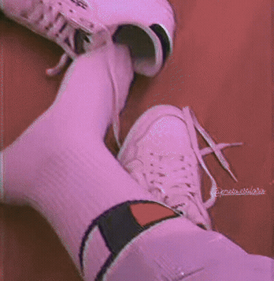 A Person Wearing Purple Socks And White Sneakers GIF