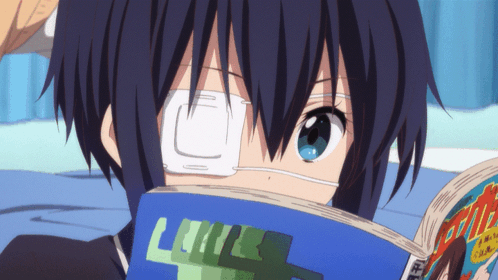 A Person With A Bandage On Their Eye Is Reading A Book With The Word Love On It GIF