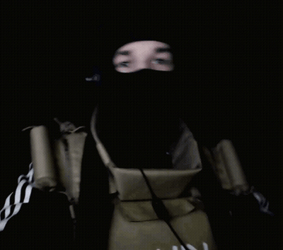 A Person With A Bandaged Hand Is Wearing A Mask And Giving The Middle Finger GIF