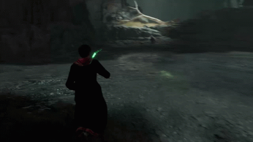 A Person With A Green Light Coming Out Of Their Hands GIF