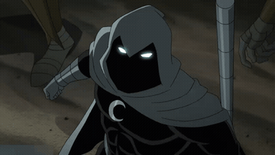 A Person With A Hood And A Crescent Moon On Their Chest GIF