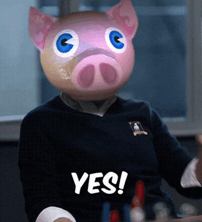 A Person With A Pig Mask On Their Head And The Word Yes Below It GIF