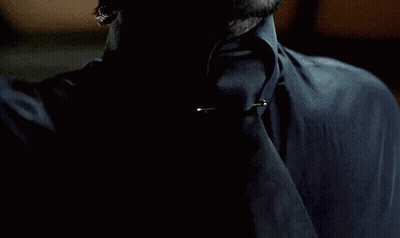A Person With A Ring On Their Finger Is Holding Something GIF