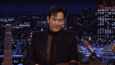 A Person With A Ring On Their Finger Is Touching A Button GIF
