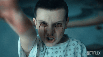 A Person With Blood Coming Out Of Their Eyes And A Netflix Logo GIF