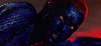A Person With Blue Paint On Their Face And Yellow Eyes GIF