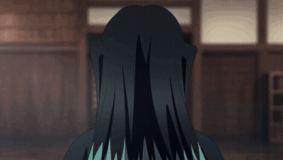A Person With Long Black Hair And Blue Eyes GIF