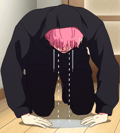 A Person With Pink Hair And A Black Hoodie Is Kneeling Down GIF