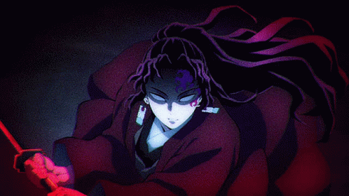 A Person With Purple Hair Is Standing In A Dark Room With A Red Object In Front Of Them GIF