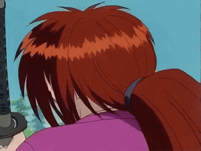 A Person With Red Hair Is Holding A Sword In Their Hand GIF