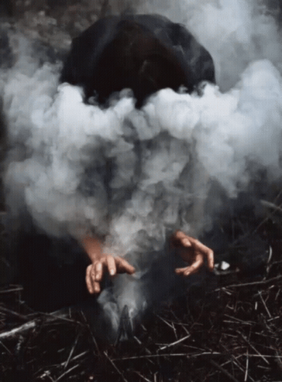 A Person With Smoke Coming Out Of Their Head GIF