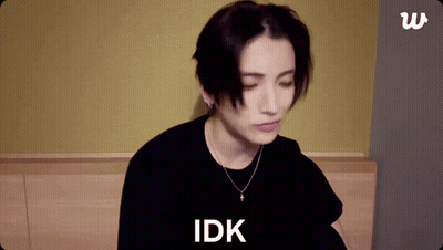 A Person With Their Eyes Closed And The Word Idk On The Bottom GIF