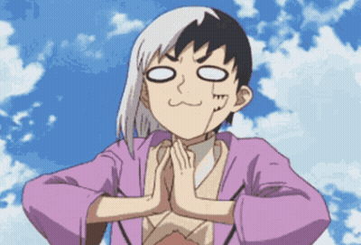 A Person With Their Hands Folded In Front Of Their Face GIF
