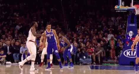 A Philadelphia Basketball Player Dribbles The Ball GIF