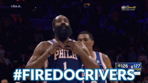 A Philadelphia Basketball Player Giving A Thumbs Up With The Hashtag #Firedocrivers GIF