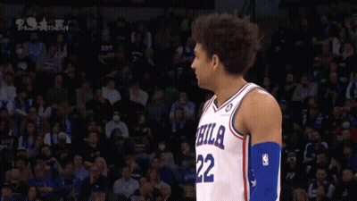 A Philadelphia Basketball Player Stands In Front Of The Crowd GIF