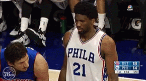 A Philadelphia Basketball Player Stands On The Court During A Game GIF