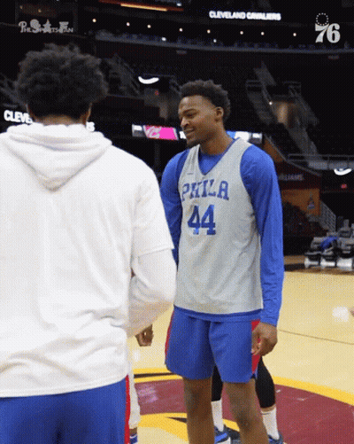 A Philadelphia Basketball Player Talks To Another Player GIF