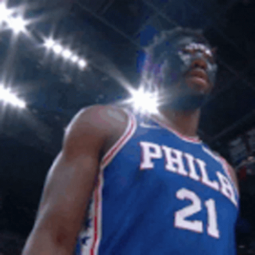 A Philadelphia Basketball Player Wearing A Mask GIF