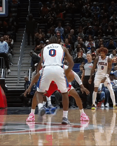 A Philadelphia Basketball Player With The Number 9 On The Back Of His Jersey GIF