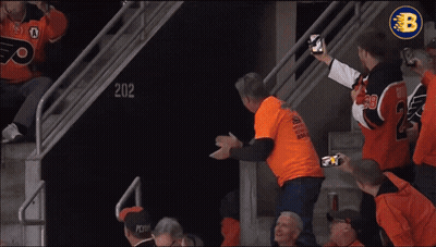 A Philadelphia Flyers Mascot Is Being Attacked By A Fan GIF