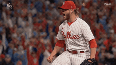 A Phillies Baseball Player Is Celebrating A Win GIF
