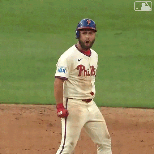 A Phillies Baseball Player Says Let 'S Go While Standing On The Field GIF