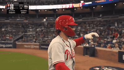 A Phillies Baseball Player Wearing A Red Helmet GIF