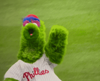 A Phillies Mascot Is Wearing A White Shirt GIF