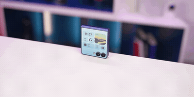 A Phone Displays The Time As 11:37 On The Screen GIF