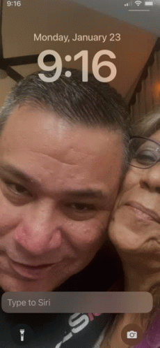 A Phone Screen Shows A Man And A Woman On Monday January 23 GIF