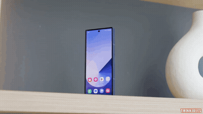 A Phone Sitting On A Shelf With The Words Thinkjules Below It GIF