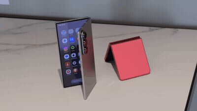 A Phone That Has A Few Apps On It Including Spotify GIF